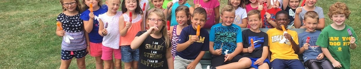 Students eating popsicles